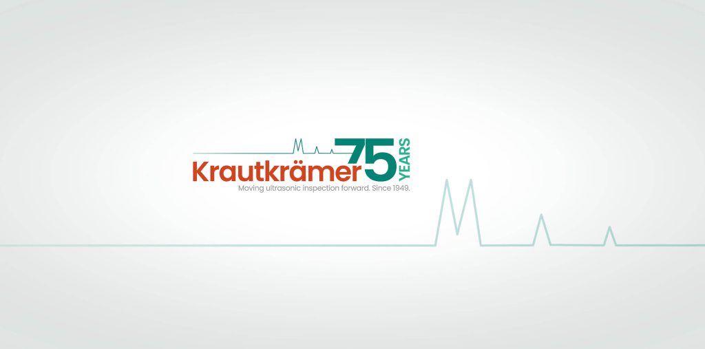 Krautkr?mer 75周年標志變體，淺色背景，文字“Krautkr?mer 75 Years”和“Moving ultrasonic inspection forward. Since 1949.”。