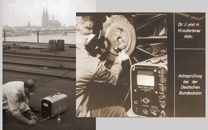 左側(cè)是科隆大教堂和河流景觀；右側(cè)是一位男子跪在地上使用設(shè)備檢查火車軌道，右側(cè)有文字“Dr. J. u. H. Krautkr?mer K?ln”和“Achsprüfung bei der Deutschen Bundesbahn”。